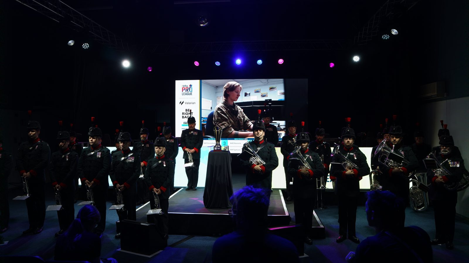 The Band of the Rifles performing on stage